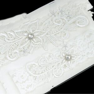 Elegant Off White Lace Bridal Garter Set